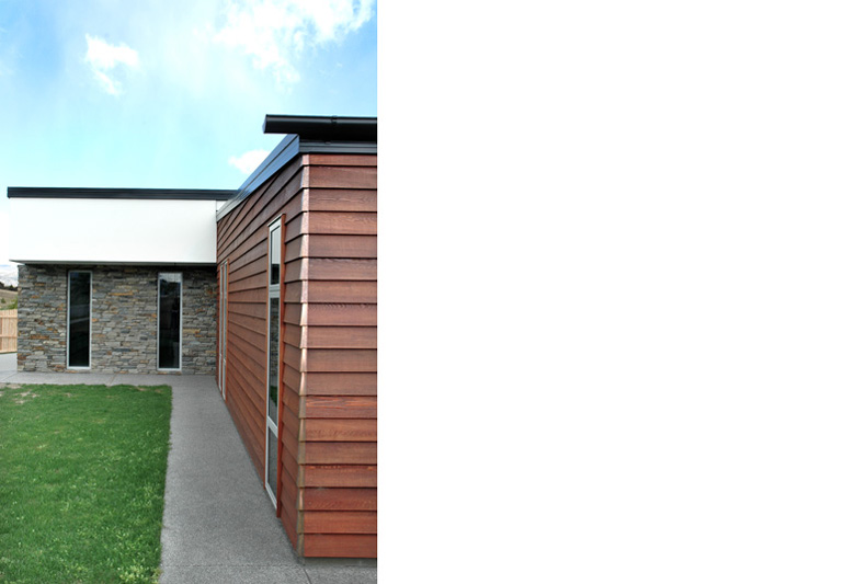 Pathway leading down the side of exterior wall