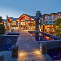 View of house from pool at night