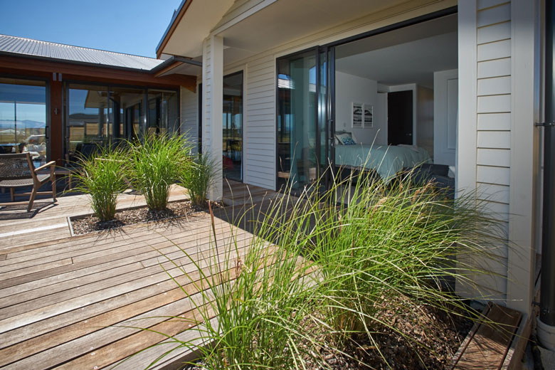 View of bedroom from outside patio looking in