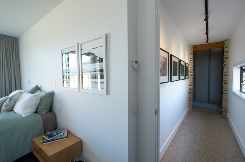 Photo of bed and hallway