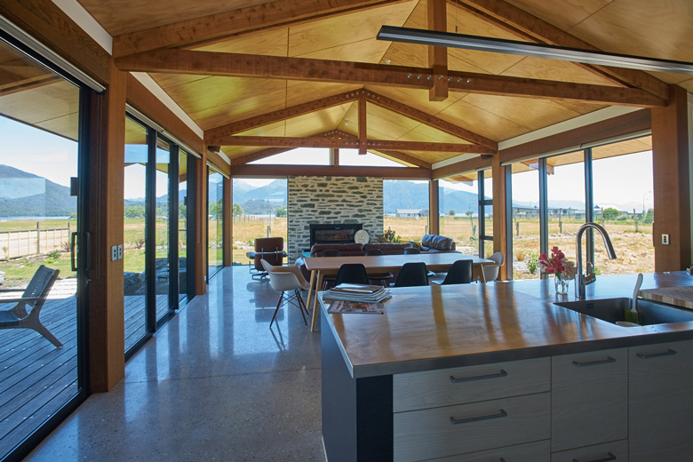 View of kitchen bench looking over to dining table