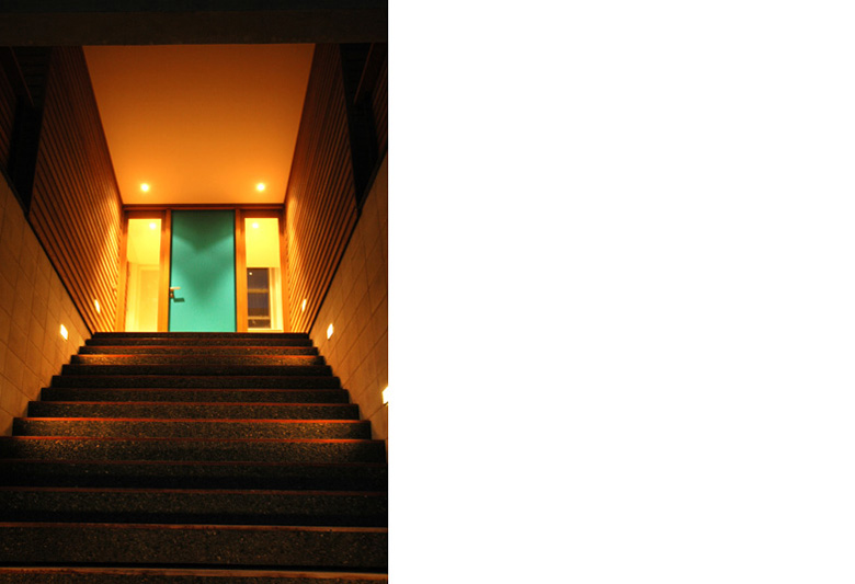 View towards main entrance from bottom of staircase