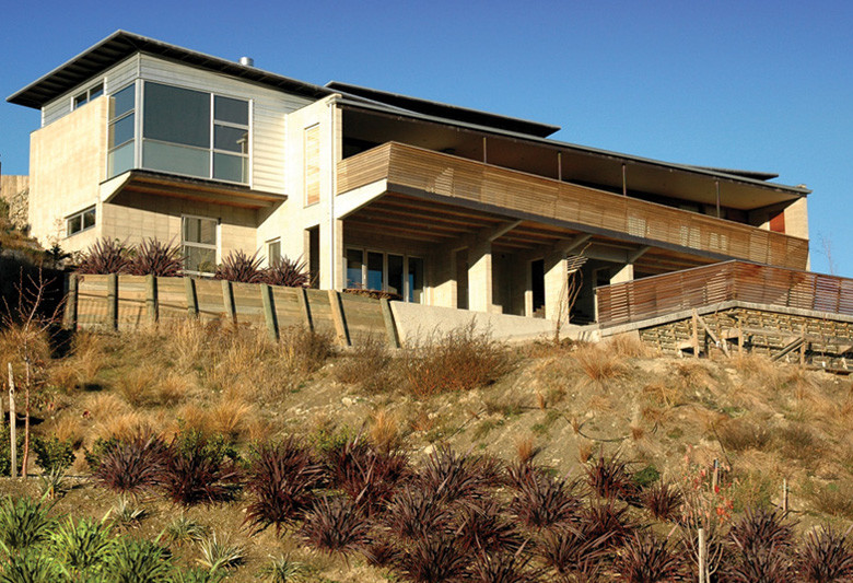 Photo of Hogan Lane house from down the bank