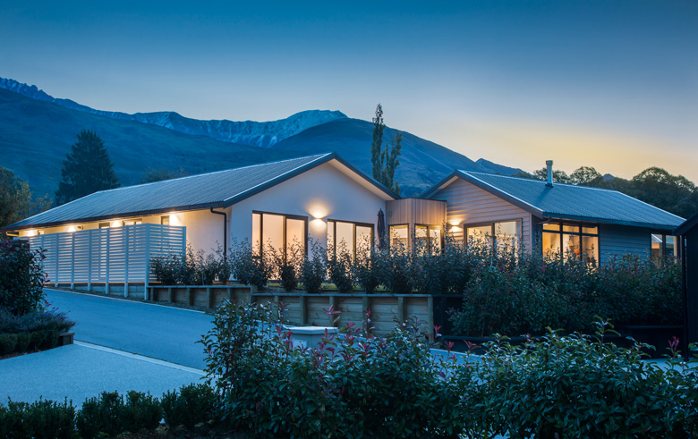 Front view of Old Station Road house in the evening