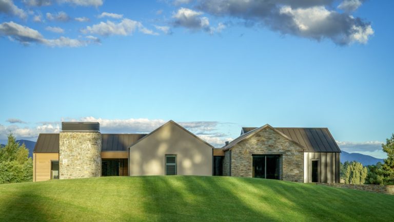 Side view of house across lawn