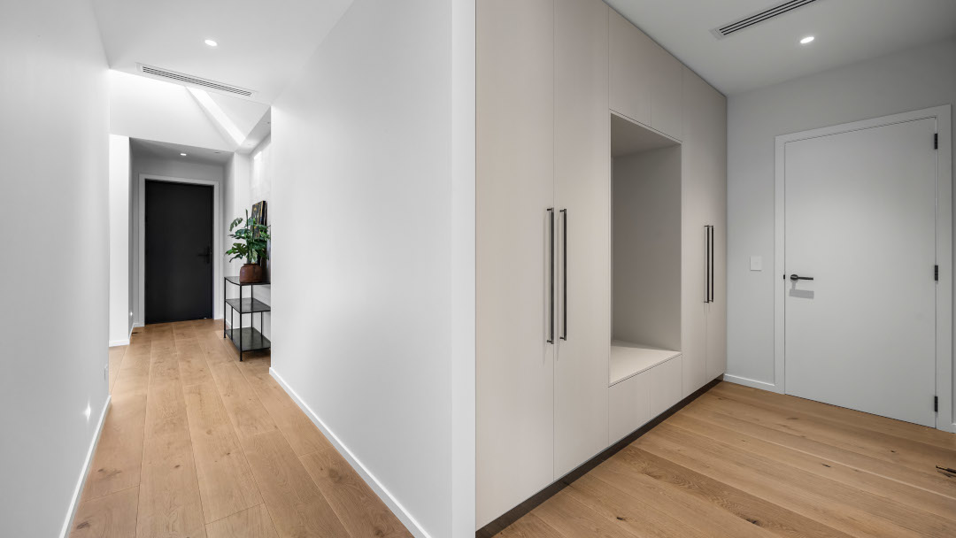 Interior view showcasing the seamless connectivity of the entry to the home’s living spaces.